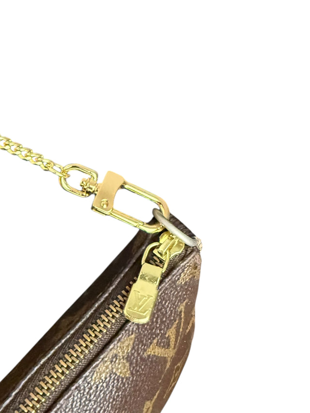 Louis Vuitton Pochette Accessoires Handtasche Monogram Braun
